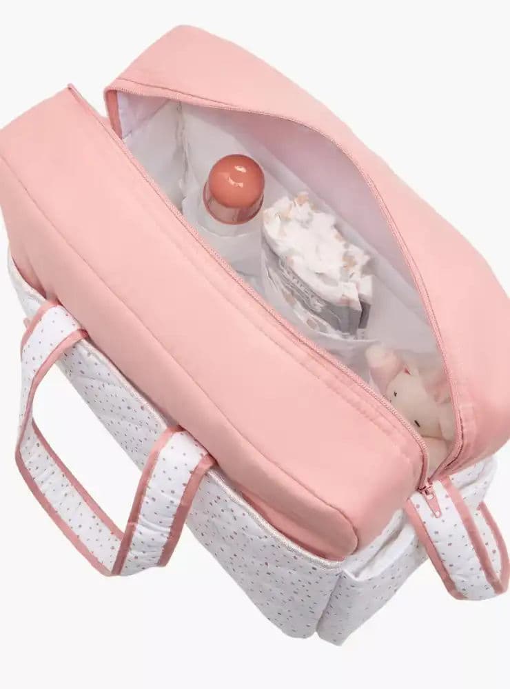 شنطة حفاضات بسحّاب إغلاق ومقابض مزدوجة وطبعات من جونيورز