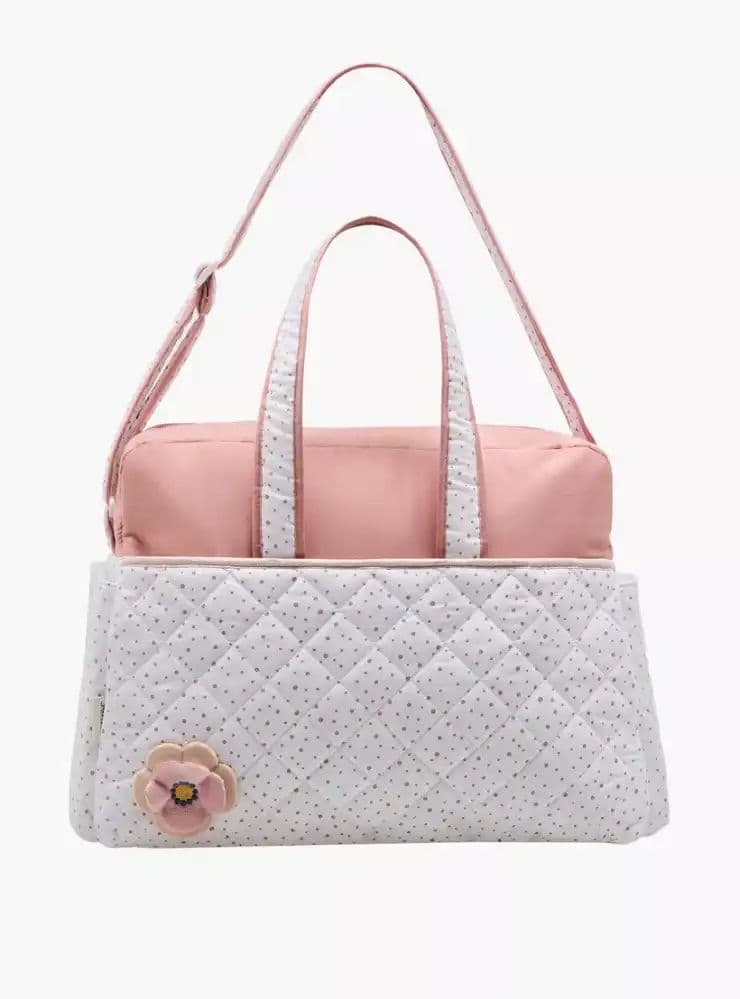 شنطة حفاضات بسحّاب إغلاق ومقابض مزدوجة وطبعات من جونيورز