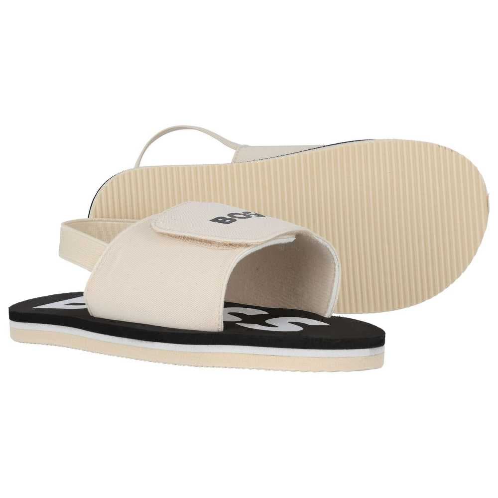 صندل اولاد بشعار بوس  باللون البيج والاسود