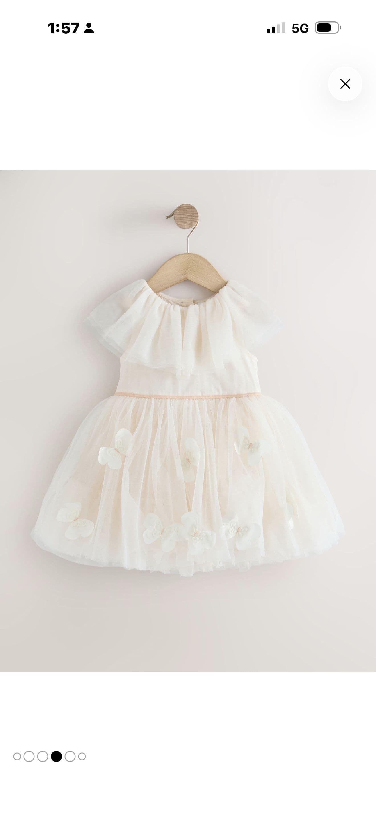 فستان بطول الركبة وياقة مستديرة  وطبعات فراشات