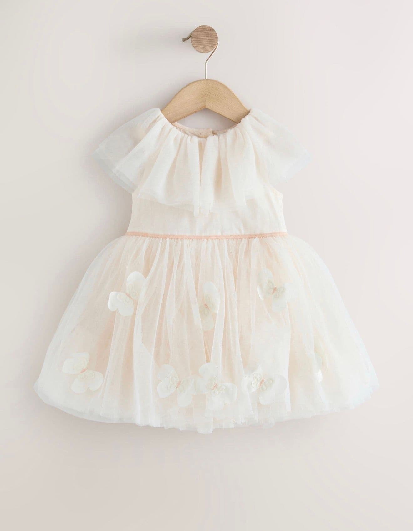 فستان بطول الركبة وياقة مستديرة  وطبعات فراشات