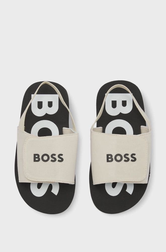 صندل اولاد بشعار بوس  باللون البيج والاسود