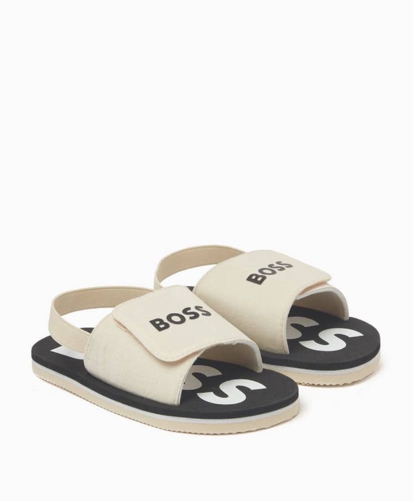 صندل اولاد بشعار بوس  باللون البيج والاسود