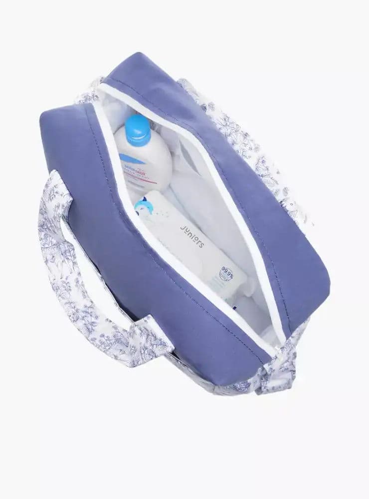 شنطة حفاضات بحزام قابل للتعديل وسحاب إغلاق وطبعات 