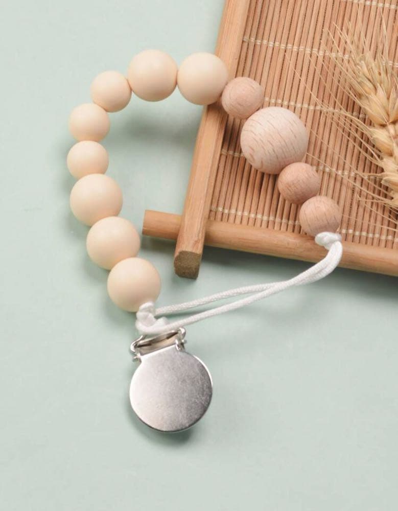 تعليقة اللهاية المطاط (بدون اسم)